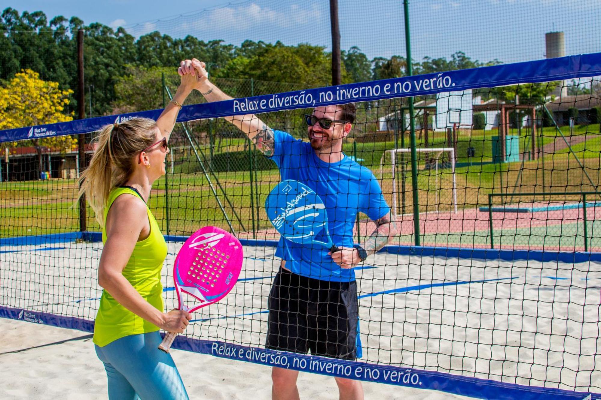 Blue Tree Thermas De Lins Resort Exterior photo A paddle tennis player